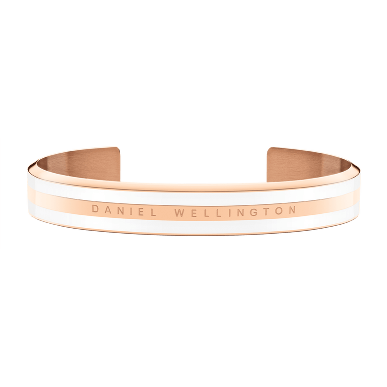 Minimalist rose gold cuff bracelet with satin white enamel detailing, featuring the Daniel Wellington logo engraved on the front.