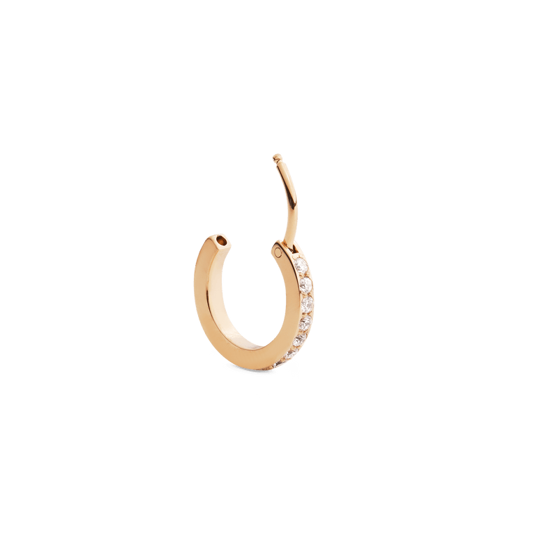 Crystal Hoop Earring Gold with an open clasp, showcasing a slim gold hoop adorned with cubic zirconia crystals along the front edge.