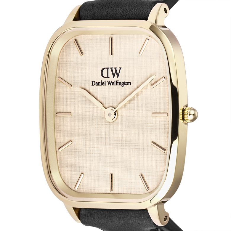 Marlon Sheffield Linen Gold men's watch featuring a polished gold cushion-shaped case, linen-textured dial, minimalist gold hour markers, and a classic black leather strap, highlighting its elegant and versatile design.