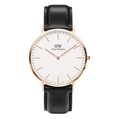 Classic Sheffield Rose Gold watch with a round eggshell white dial, slim rose gold markers and hands, and a smooth black leather strap for a timeless, versatile look.