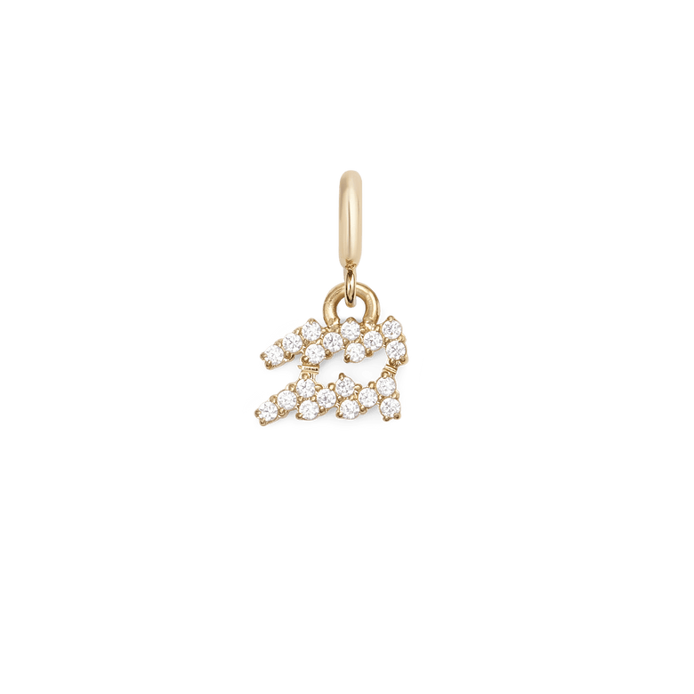 Gold zodiac watch charm featuring the Aquarius symbol, set with sparkling cubic zirconia crystals and a polished finish, designed for stacking or adding to a charm bracelet.