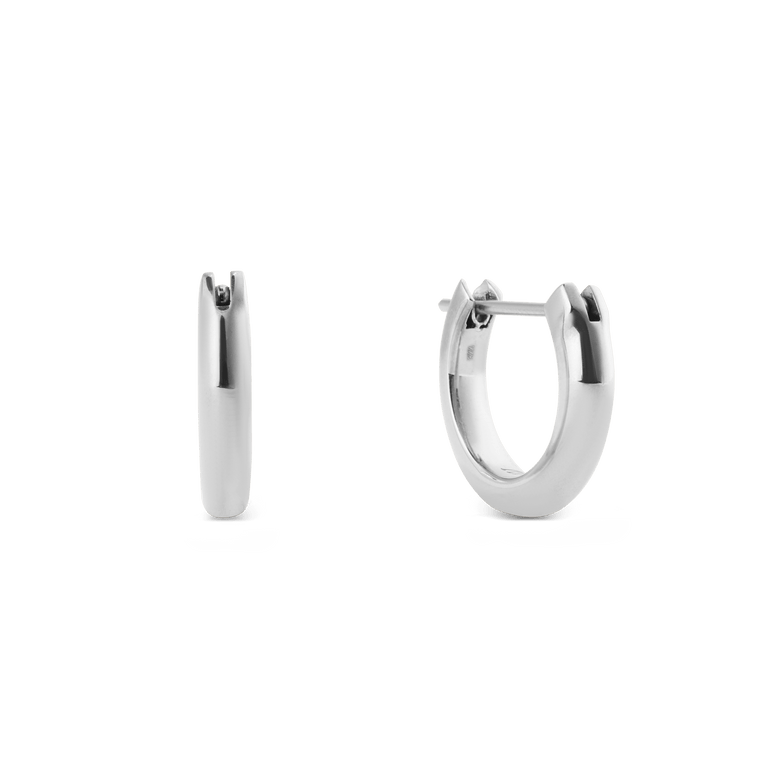 A pair of Arch Earring Silver 9mm hoop earrings crafted from polished stainless steel, featuring a minimalist curved design with a slim 2.5 mm profile and secure pin closure.