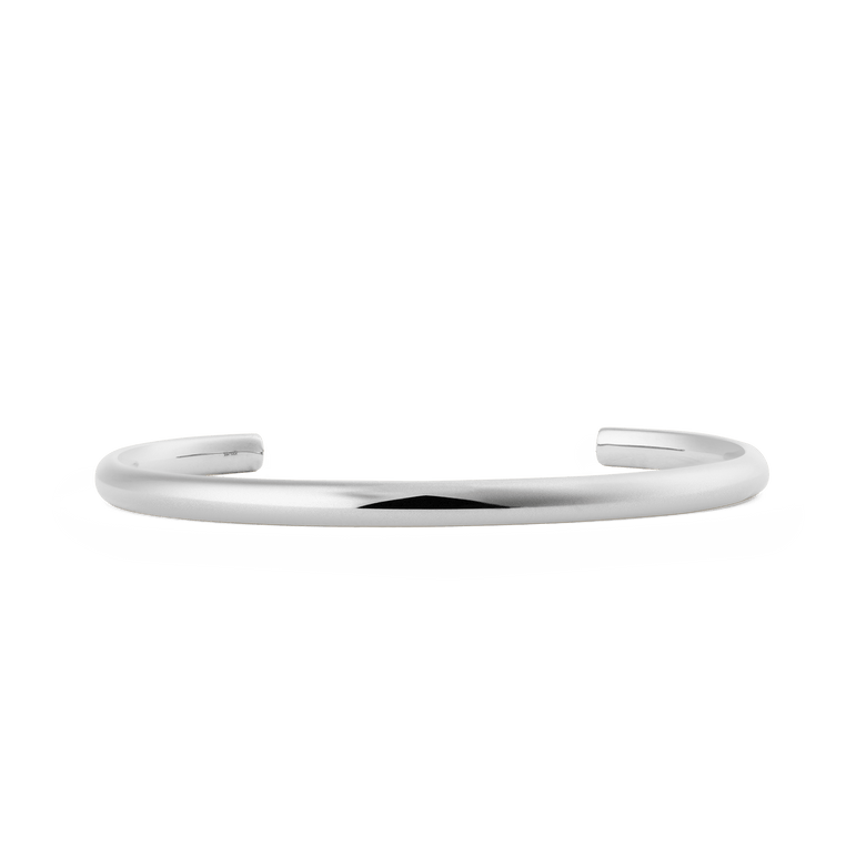 Polished silver Arch Cuff bracelet with a minimalist, open-ended design and smooth rounded edges, crafted from 316L stainless steel for a timeless and versatile look.