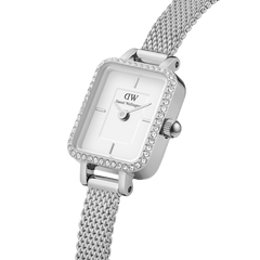Quadro Mini Lumine Bezel Silver ladies watch featuring a rectangular white dial, crystal-studded bezel, and a sleek silver mesh strap, shown in close-up to highlight its refined details and modern design.