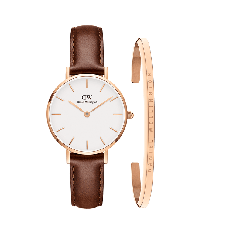 Petite St Mawes + Classic Bracelet Rose Gold set featuring a petite round watch with a white minimalist dial, rose gold case, and brown leather strap, paired with a slim rose gold bracelet engraved with Daniel Wellington branding.