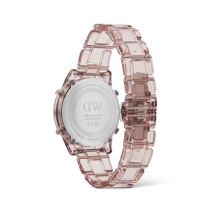 Back view of the Retro Digital Dark Pink Dark Pink watch showing the stainless steel case back, transparent pink bio-based plastic strap, and secure butterfly clasp.
