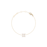 Crystal Zodiac Chain Bracelet Gold featuring a slim gold chain with adjustable sizing rings and a sparkling Gemini zodiac charm at the centre.