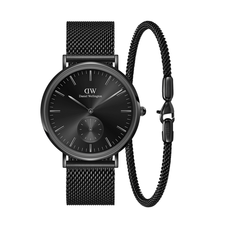 Classic Multi Eye Ashfield & Bracelet Black set featuring a men’s round black dial watch with minimalist markers and a matching slim black mesh bracelet, both with adjustable clasps for a sleek, coordinated look.