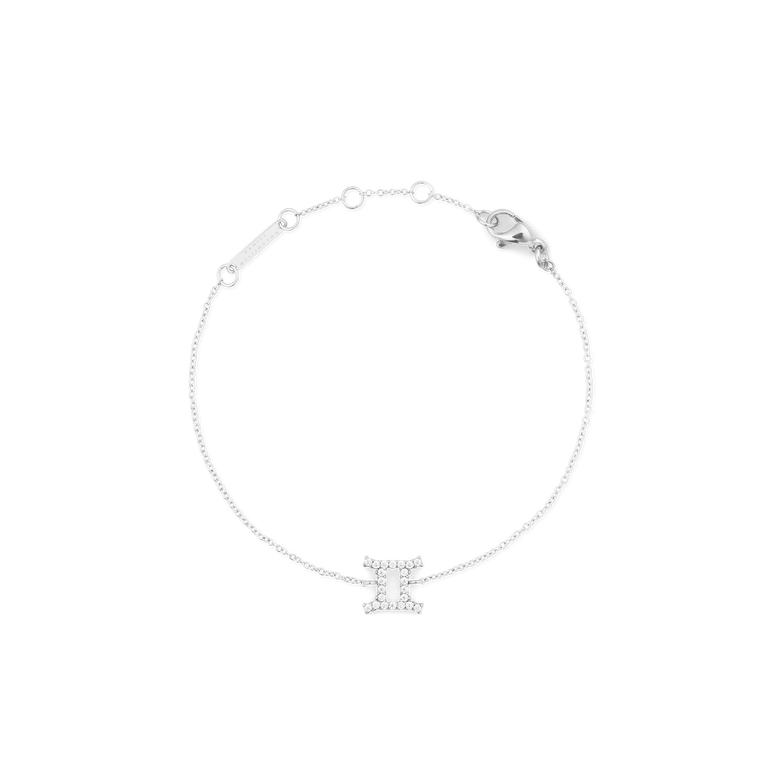Delicate silver chain bracelet featuring a Gemini zodiac charm set with hand-placed crystals, adjustable for a comfortable fit and finished with a secure lobster clasp.