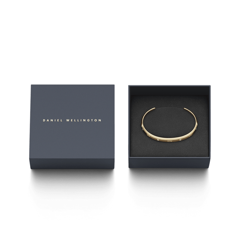 Classic Lumine Bracelet G presented in a Daniel Wellington gift box, showcasing its slim gold cuff and sparkling crystal accents, ideal for gifting or special occasions.
