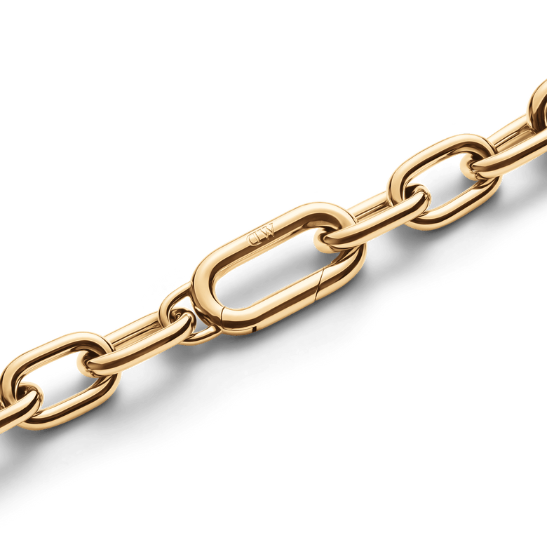 Detail of the Crystal Link Bracelet Gold showing the polished gold-plated links and integrated spring gate clasp, highlighting the smooth finish and secure closure.