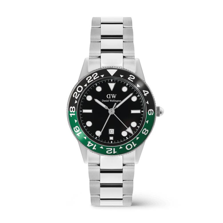 Daniel Wellington Iconic GMT Link Black Green Ceramic Bezel Silver men's watch with a black dial, green and black ceramic bezel, and a silver stainless steel bracelet, featuring a date display and 24-hour GMT function.