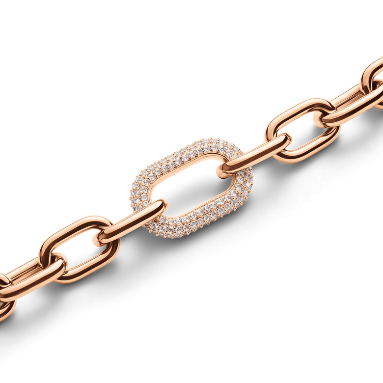 Rose gold crystal link bracelet featuring a delicate chain and a pavé crystal accent, designed for a comfortable fit and understated sparkle.
