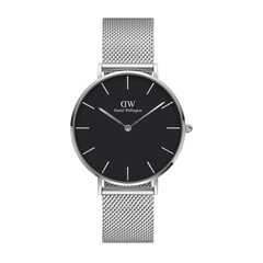 Petite Sterling Black Silver showcases a refined black dial with slim hour markers and a polished silver mesh strap, offering a contemporary and lightweight design ideal for petite wrists.