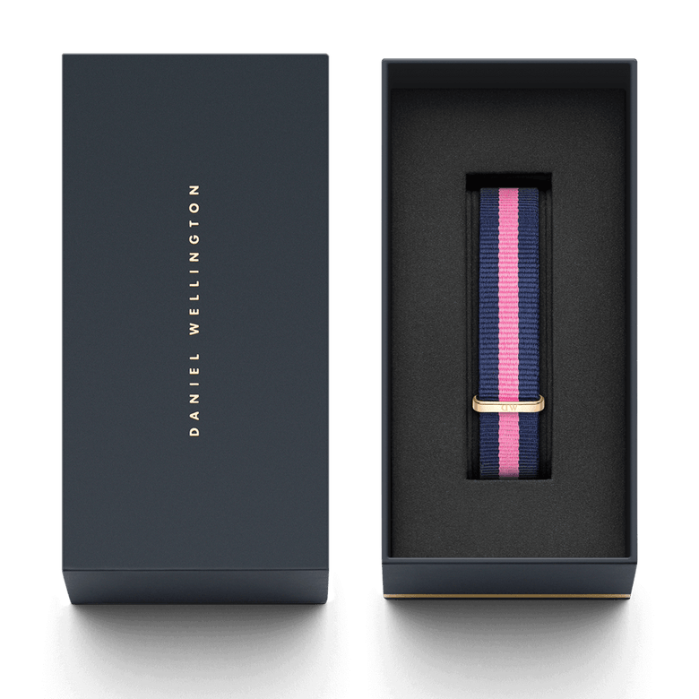 Winchester Strap Rose Gold 18mm NATO watch strap with navy and pink stripes and a rose gold buckle, presented in a sleek Daniel Wellington gift box.