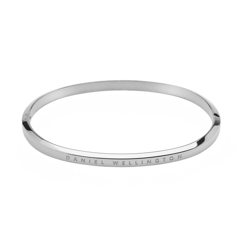 Classic Bangle Silver featuring a slim, polished stainless steel design with the Daniel Wellington logo engraved along the edge, ideal for layering or wearing alone.