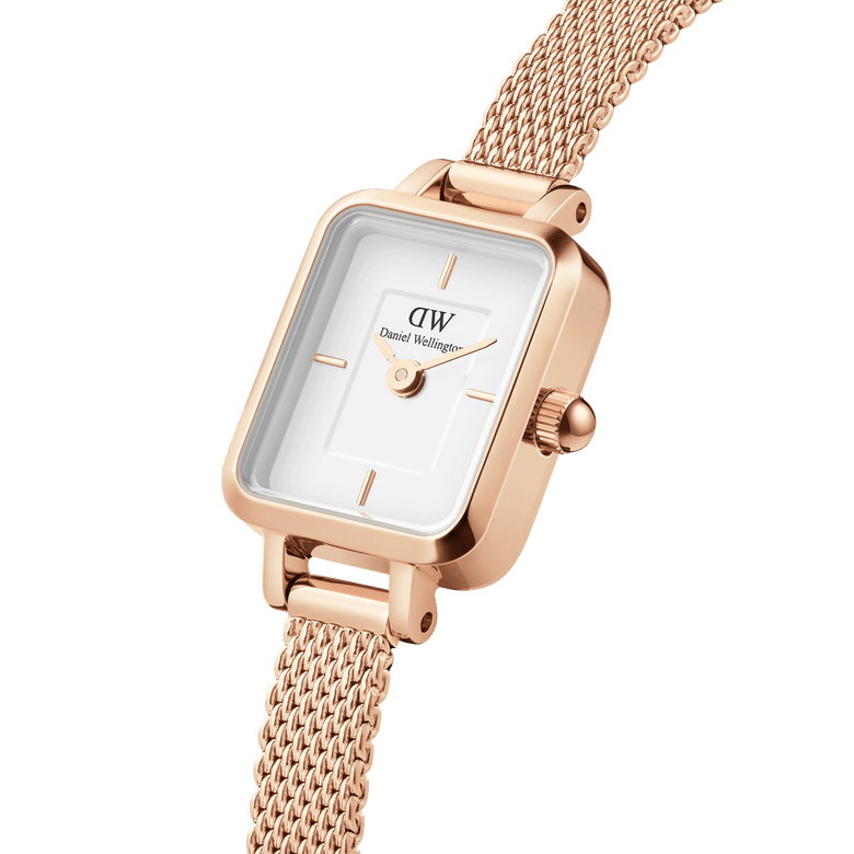Quadro Mini Melrose featuring a rectangular white dial, rose gold mesh strap, and polished rose gold case, highlighting its minimalist design and delicate styling for women.