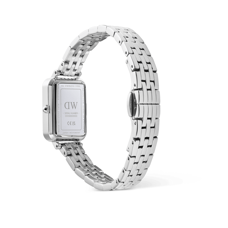 Rear view of the Quadro Roman Numerals Date 5-link Silver watch, showing the stainless steel case back, polished 5-link bracelet, butterfly clasp, and engraved details including serial number and Japanese movement.