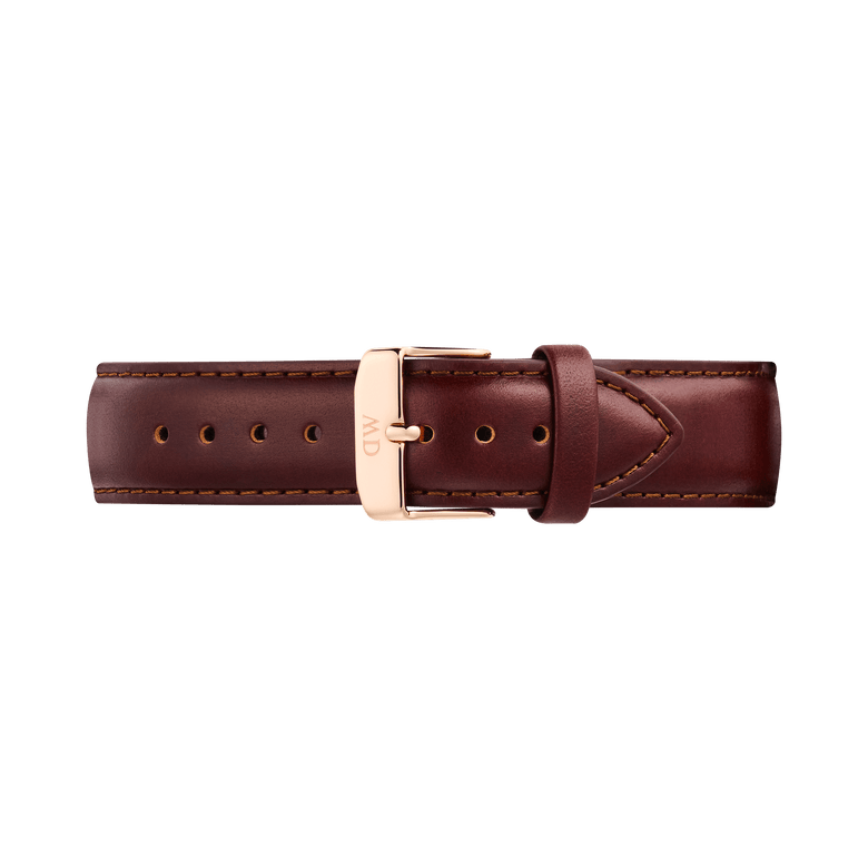 Brown leather watch strap with polished rose gold pin buckle, featuring subtle stitching and a tapered design suitable for men's watches.