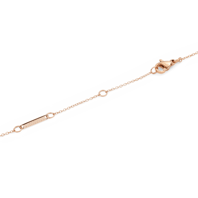 Detail of the Crystal Zodiac Chain Necklace Rose Gold showing the adjustable sizing rings, secure lobster clasp, and a branded bar on the fine rose gold chain.