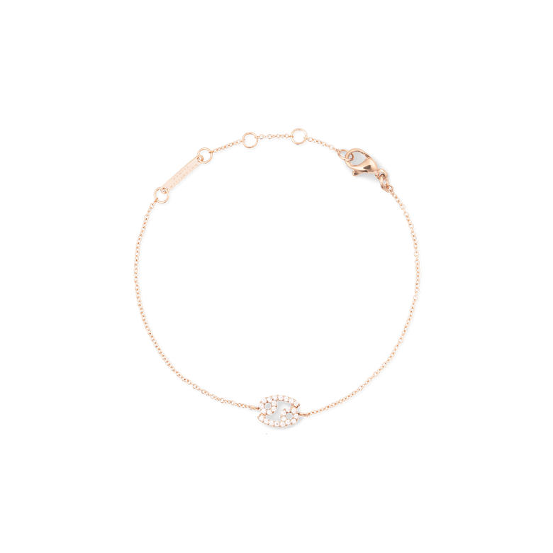 Delicate rose gold chain bracelet featuring an adjustable length and a crystal-encrusted zodiac pendant, designed for a subtle, personalised touch to everyday jewellery.