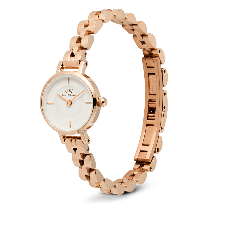 Petite Mini Arch 3-link White Rose Gold watch with a slim rose gold three-link bracelet, crisp white dial, and polished rose gold indices, shown with its adjustable butterfly clasp open for a clear view of its elegant design.