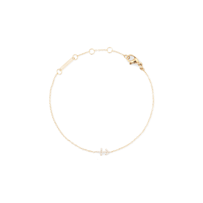 Crystal Zodiac Chain Bracelet Gold with a slim gold chain, adjustable sizing rings, and a crystal-set Sagittarius zodiac charm.