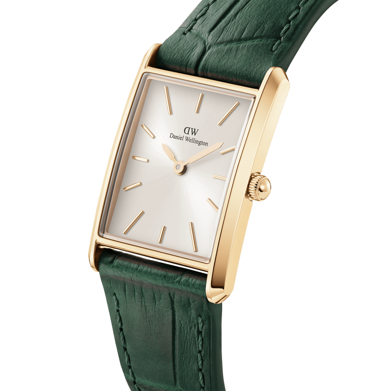 Bound Crocodile Champagne Sunray Gold watch featuring a rectangular gold case, champagne sunray dial, minimalist gold hour markers, and an emerald green crocodile-pattern leather strap.