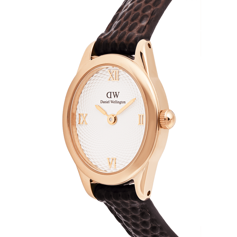 Close-up of the Ophelia Mini Dark Brown Lizard White Guilloché Rose Gold watch, highlighting its polished rose gold oval case, textured white guilloché dial with Roman numerals, and dark brown lizard-embossed leather strap.