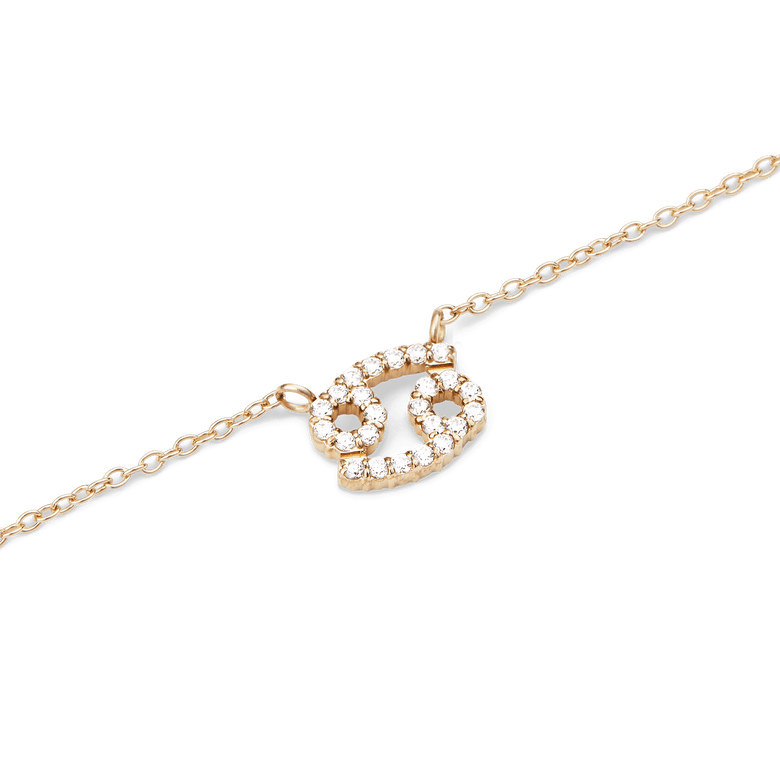 Close-up of the Crystal Zodiac Chain Necklace Gold featuring a Cancer zodiac pendant encrusted with sparkling crystals on a fine gold chain.