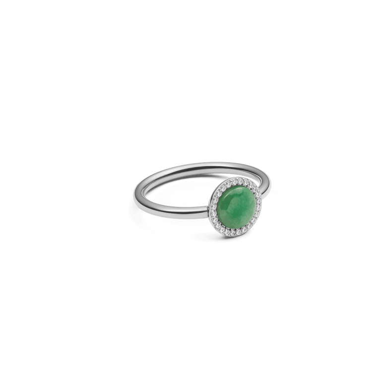 Audrey Ring Jade Silver features a polished silver band with a domed green jade centrepiece surrounded by a halo of white cubic zirconia, offering a refined and contemporary look.