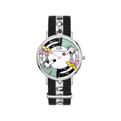 Limited edition Steven Harrington x Daniel Wellington 36mm watch featuring a colourful printed dial with psychedelic-pop artwork, stainless steel case, and a black and white NATO strap with a graphic eye-print.