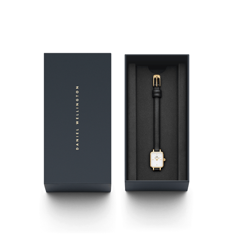 Quadro Mini Sheffield Gold ladies watch with a rectangular gold-tone case and black leather strap, presented in a sleek Daniel Wellington branded gift box.