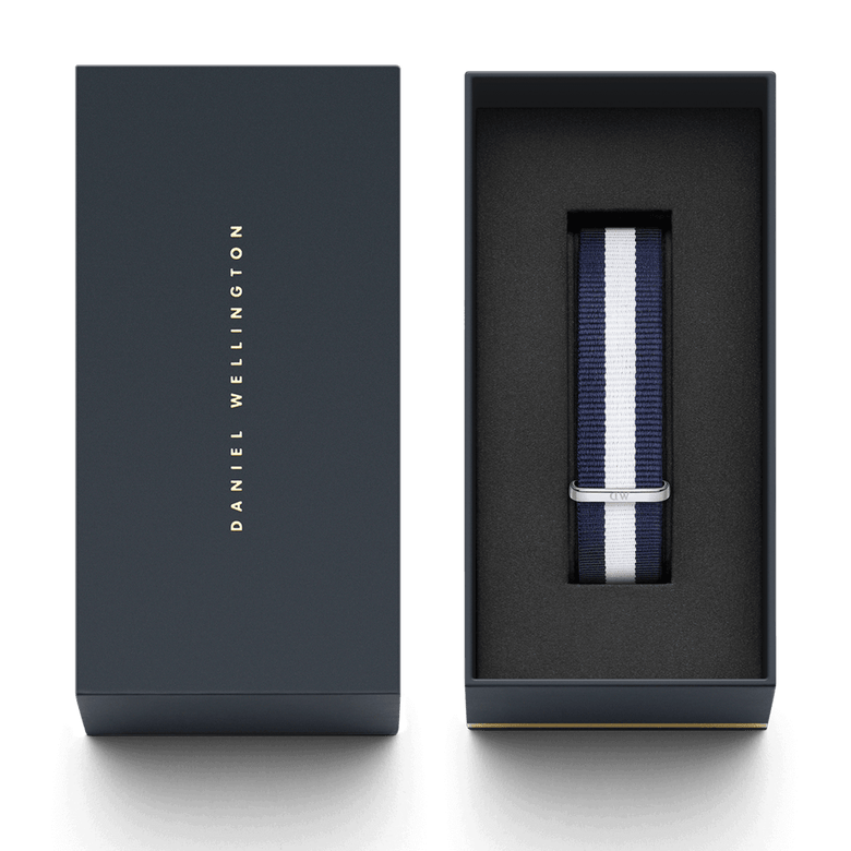 Glasgow Strap Silver presented in Daniel Wellington’s signature packaging, featuring a navy and white striped NATO style watch strap with a polished silver buckle.