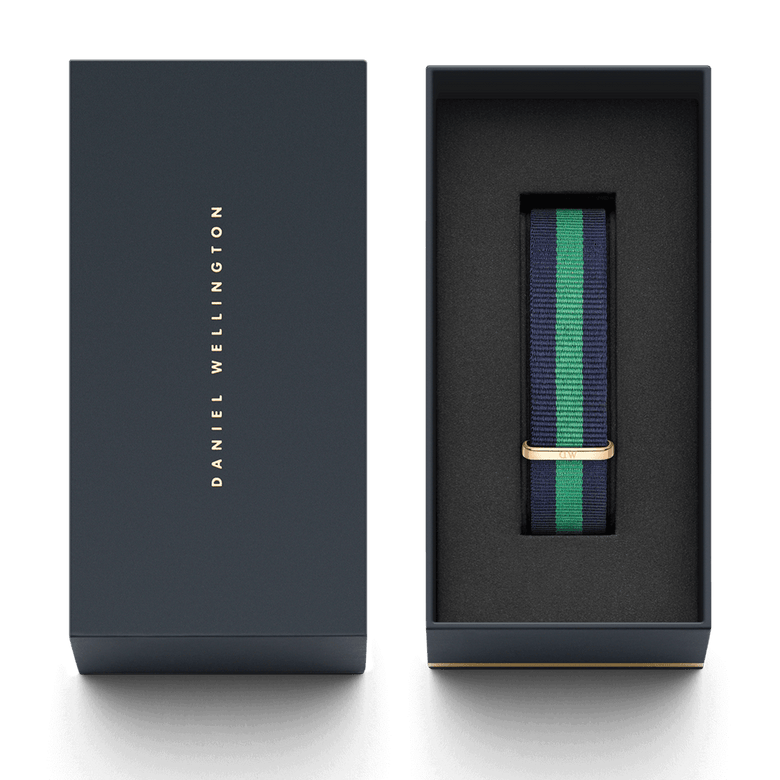 Warwick Strap Rose Gold with navy and green stripes and a rose gold buckle, presented in a premium Daniel Wellington gift box, ideal for gifting or updating your watch collection.