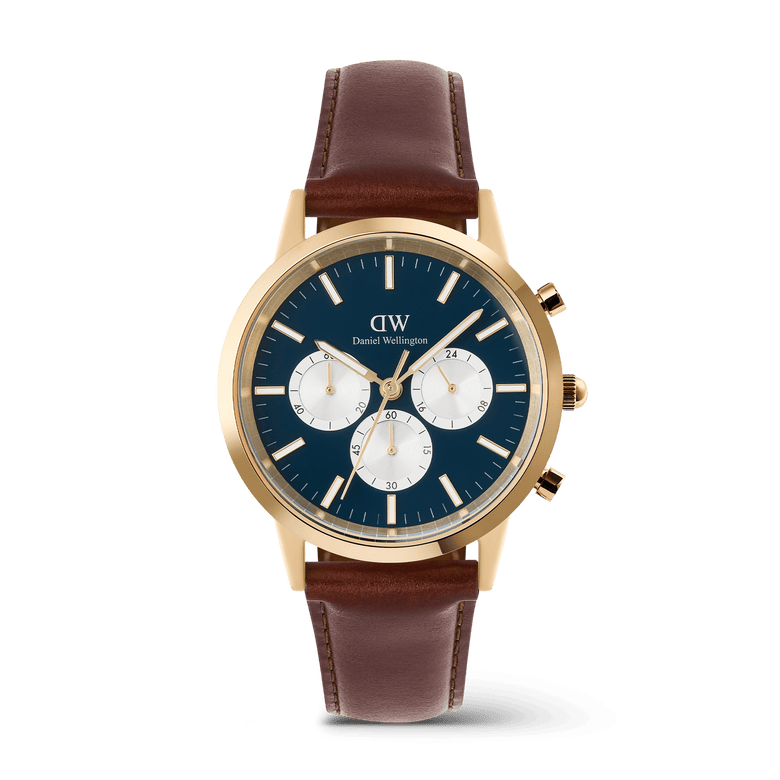 Iconic Chronograph St Mawes Arctic Panda Gold watch featuring a gold case, deep blue dial with white sub-dials, luminous hands and indexes, and a brown stitched leather strap.