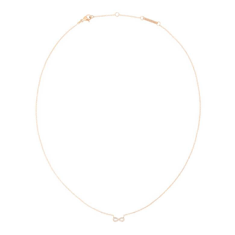 Delicate rose gold necklace featuring a fine chain and a small infinity pendant set with sparkling white cubic zirconia, designed for a minimalist and elegant look.