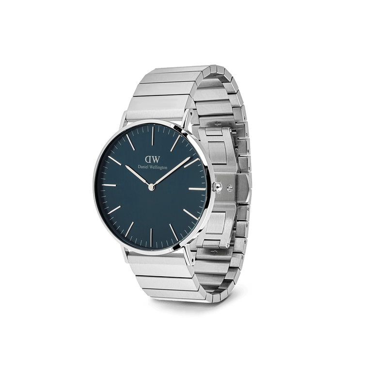 Classic Piano Link Arctic Silver men's watch featuring a brushed arctic blue dial, slim silver case, and a geometric stainless steel piano link strap, shown at an angle to highlight its modern, minimalist design.