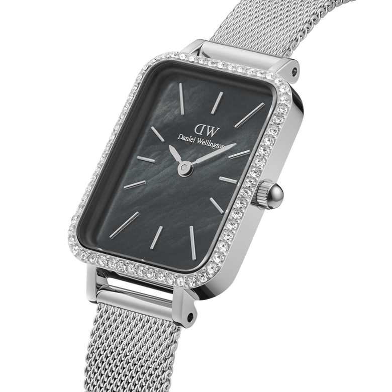 Quadro Lumine Bezel Sterling Black MOP features a rectangular black mother of pearl dial with gemstone bezel detailing and a slim silver mesh strap, highlighting its elegant and modern design for women.