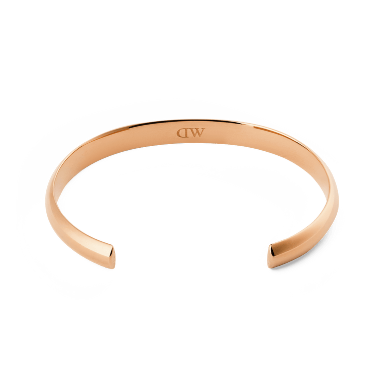 Arch Cuff Rose Gold 6mm bracelet with a polished, mirror-like finish, gently rounded edges, and a subtle engraved logo on the inside.