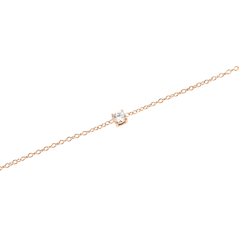Close-up of the Mirelle Solitaire Bracelet Rose Gold, highlighting the slim rose gold chain and the single white cubic zirconia crystal in a minimal setting.