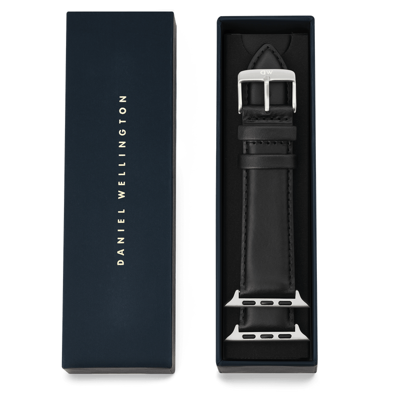 Smartwatch Leather Strap Sheffield Silver presented in a Daniel Wellington gift box, featuring smooth black Sheffield leather, subtle stitching, and a polished silver pin buckle with Apple Watch connectors.