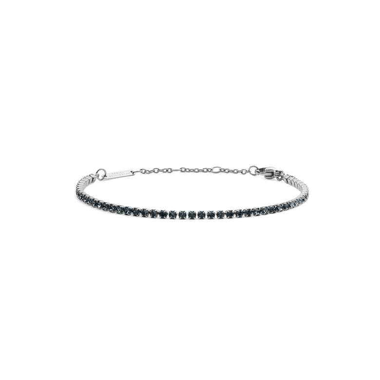 Slim silver tennis bracelet featuring a row of deep, dark Preciosa crystals set in polished stainless steel, with an adjustable chain and secure lobster clasp for a comfortable fit.