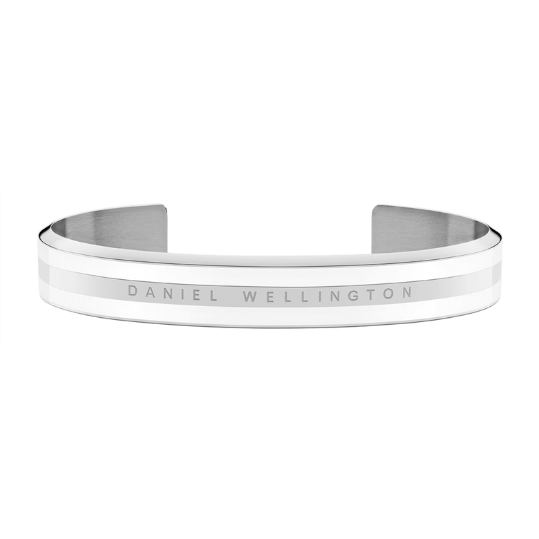 Emalie Bracelet Silver showcases a sleek open cuff style with polished silver and satin white enamel detailing, featuring the Daniel Wellington branding engraved across the front.