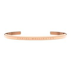 Classic Bracelet Rose Gold by Daniel Wellington, featuring a slim, adjustable open cuff in PVD plated rose gold with minimalist engraved branding, suitable for both men and women.