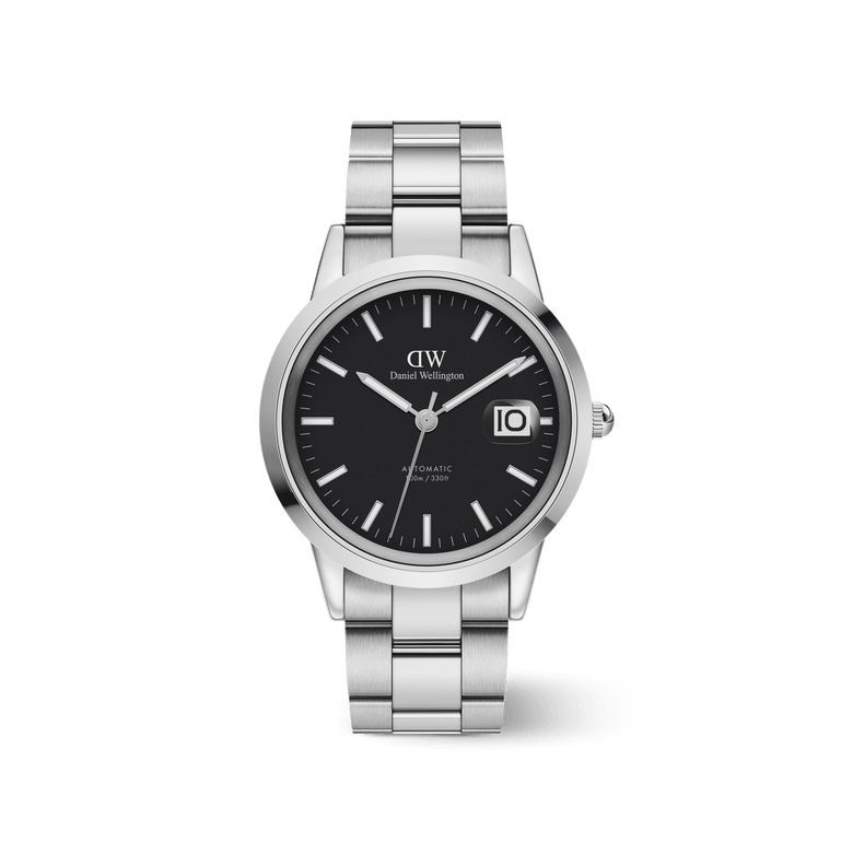 Daniel Wellington Iconic Link Automatic watch with a black dial, luminous hour markers, and a magnified date window, set in a polished stainless steel bracelet and 40mm case.