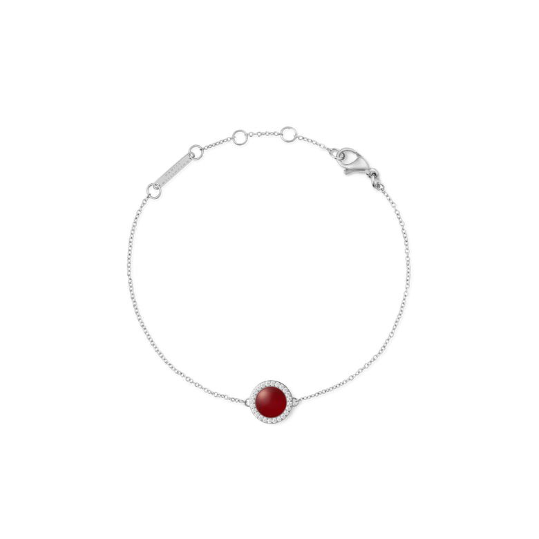 Delicate silver bracelet featuring a domed red agate centrepiece surrounded by a halo of white cubic zirconia crystals, with an adjustable chain and lobster clasp.