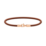St Mawes Bracelet Rose Gold featuring a slim brown leather band and a rose gold-plated stainless steel lobster clasp, shown against a plain background.