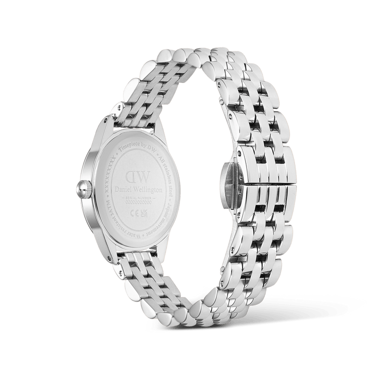 Rear view of the Ophelia Mini Arctic Silver watch showing the engraved case back, polished stainless steel oval case, and slim 5-link silver bracelet with butterfly clasp.