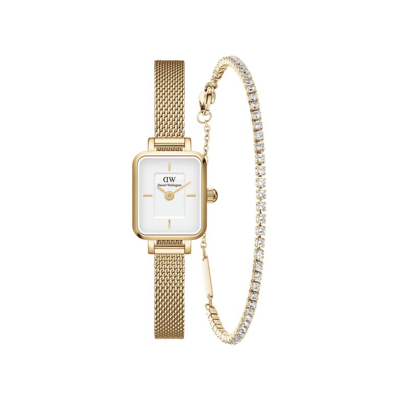 Daniel Wellington Quadro Mini watch with a gold mesh strap and rectangular white dial, paired with a gold tennis bracelet featuring sparkling stones, displayed side by side as an elegant women's accessory set.